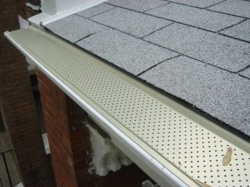 Leaf guard installed on an eavestrough in North York