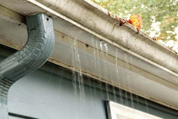 Leaking gutter overflowing — a sign it is time to call the eavestrough experts in Vaughan